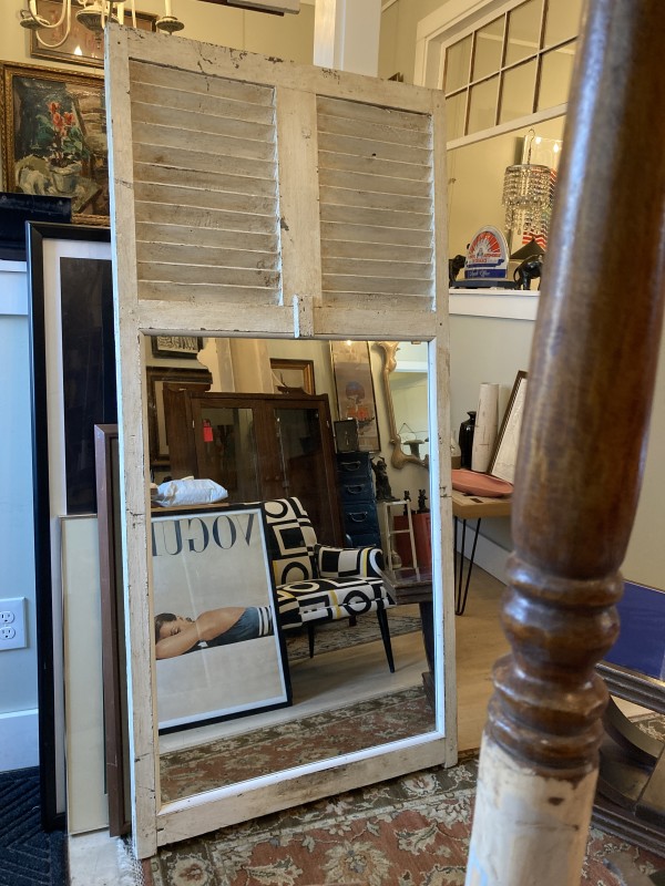 Framed architectural shuttered mirror