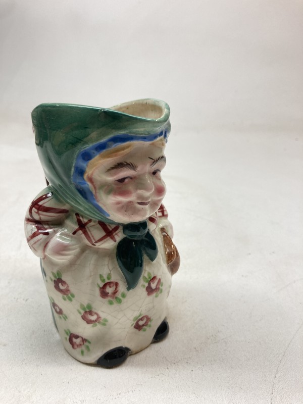 Figural pottery pitcher