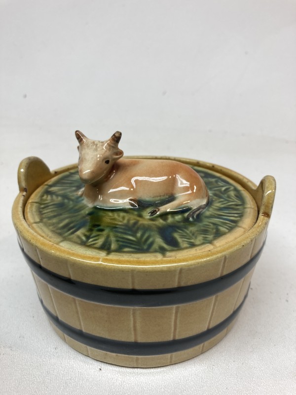 Majolica cow covered butter dish