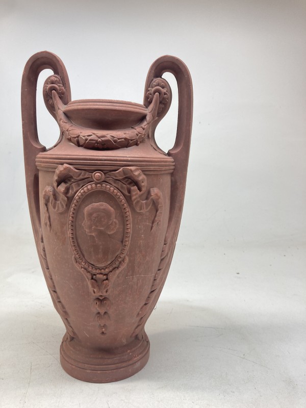 carved handled vase with handles