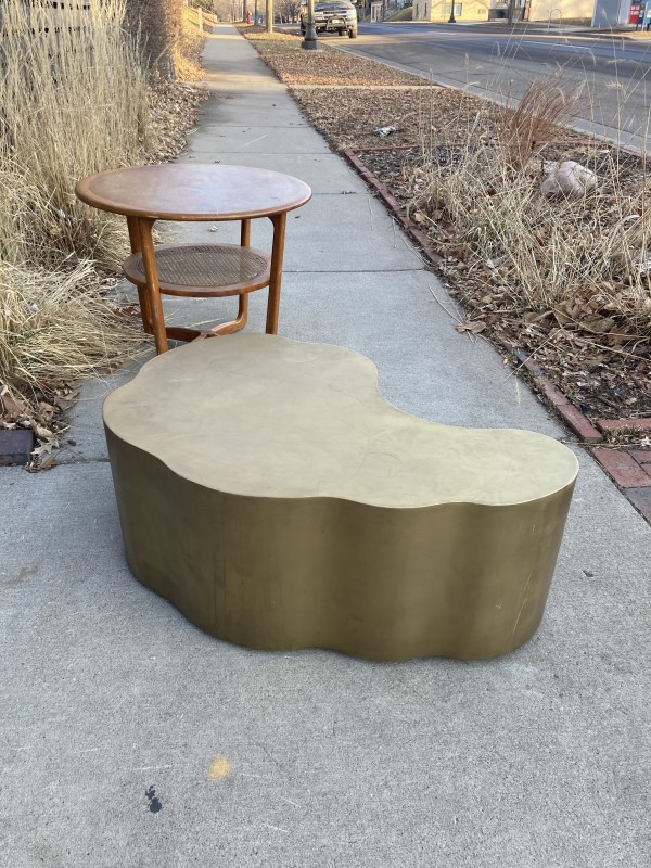brass colored metal modern table