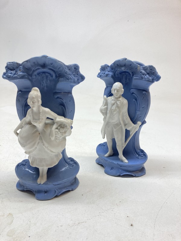 pair of blue and white figural vases