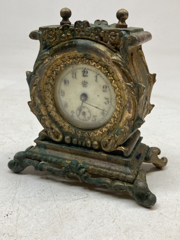 small waterbury ornate metal clock