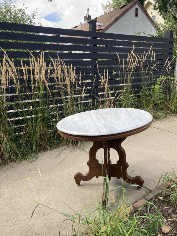 Marble top oval table