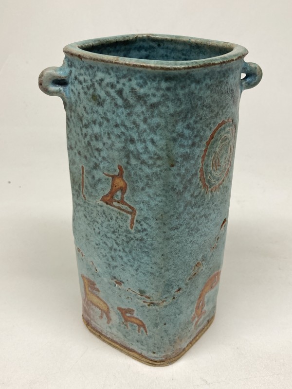 Handmade pottery vase with cave drawing scenes