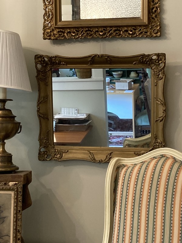 Framed ornate mirror