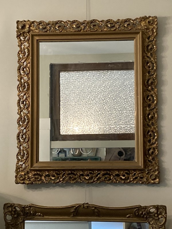 Framed ornate mirror