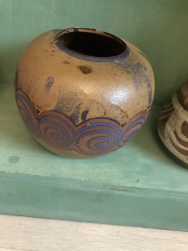 Scandinavian pottery vase with purple swirls