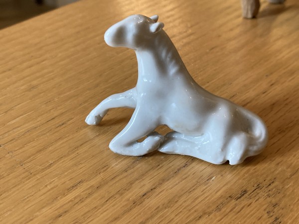 small white porcelain horse figure