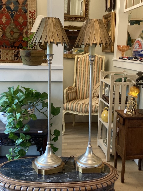 Pair of Hollywood Regency tall candlestick lamps