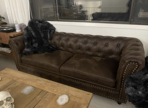 Upholstered Chesterfield sofa