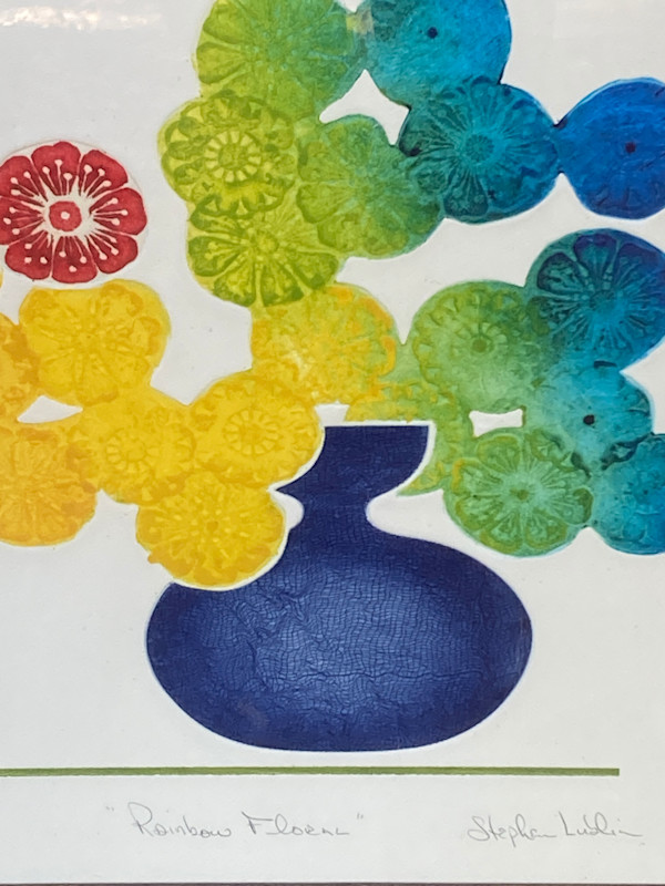 framed bright flowers with blue and yellow