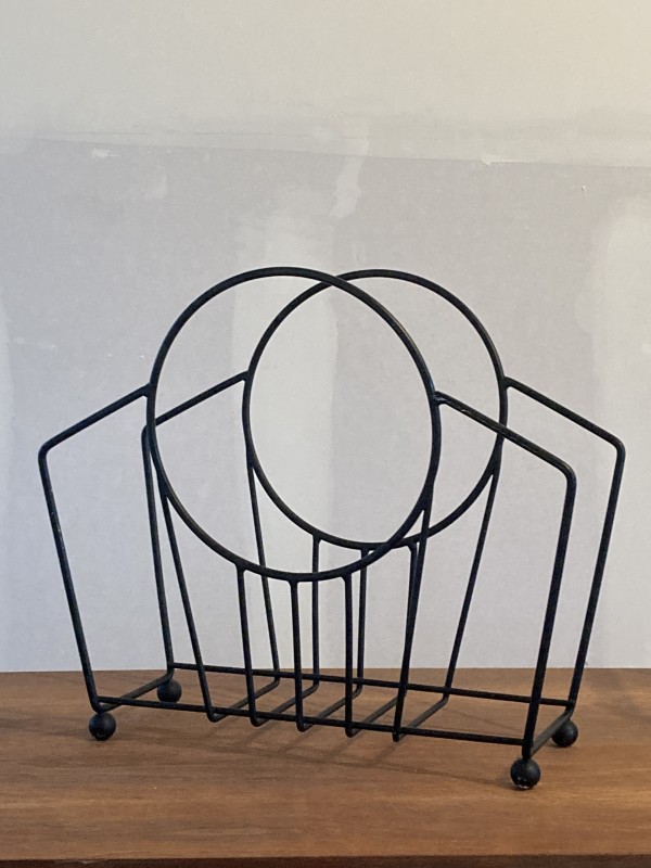 Post modern iron magazine rack