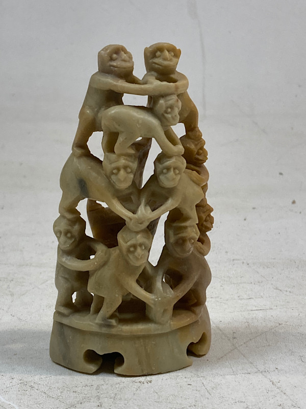 Carved monkey soapstone sculpture
