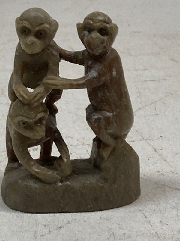 Carved monkey soapstone sculpture
