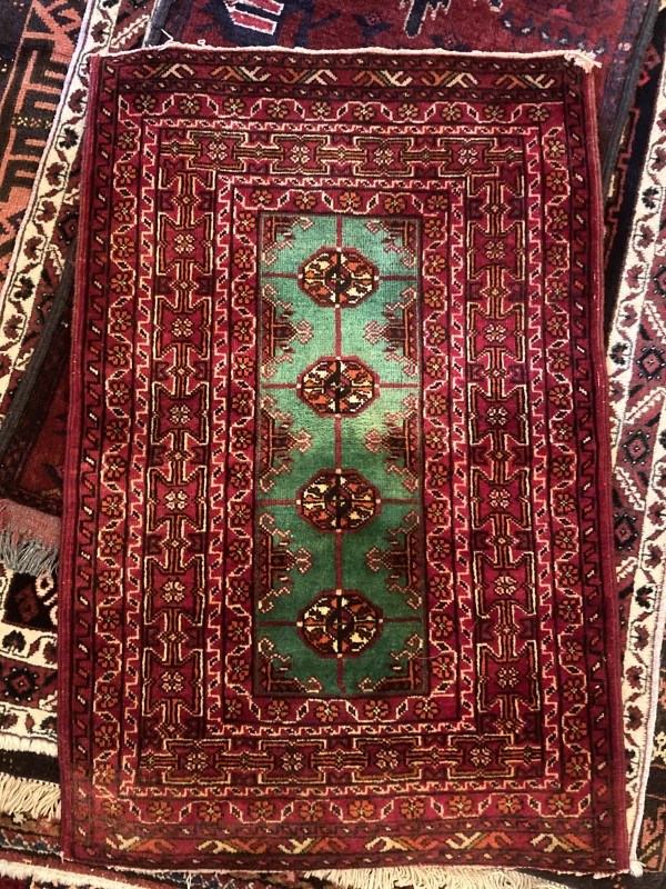 trimmed hand made Turkish wool rug
