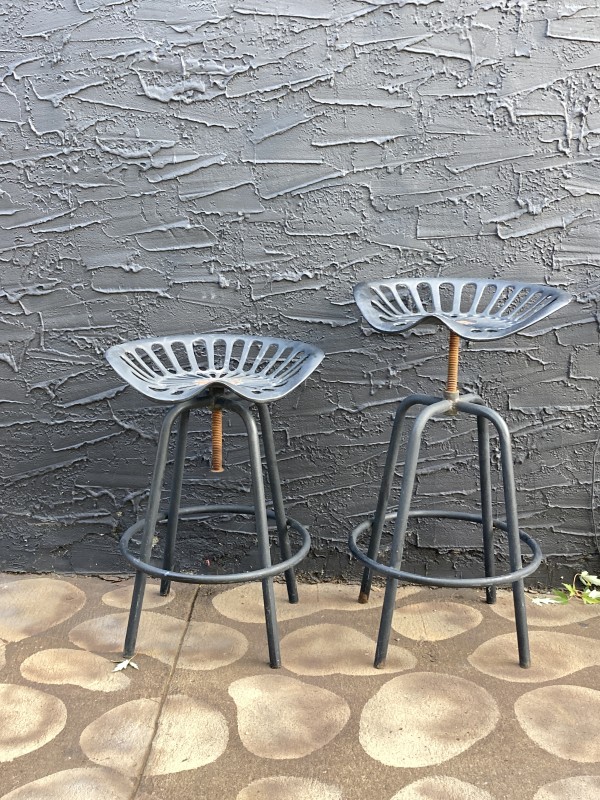 Pair of outdoor tractor seat stools