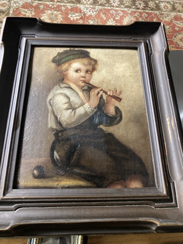 Framed original oil painting of boy with flute