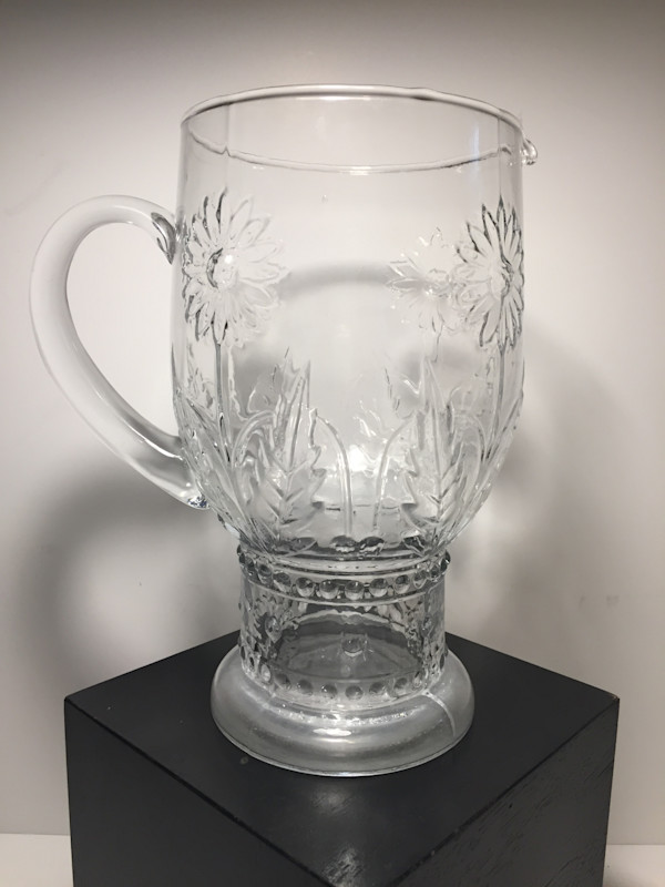 Art glass clear pitcher with pressed flowers