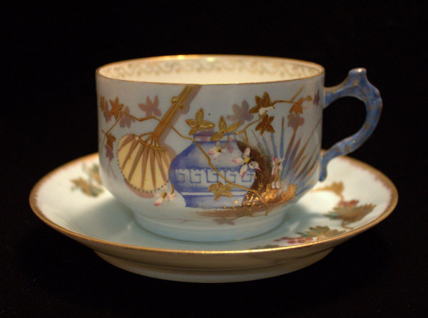Cup and Saucer by A. Klingenberg
