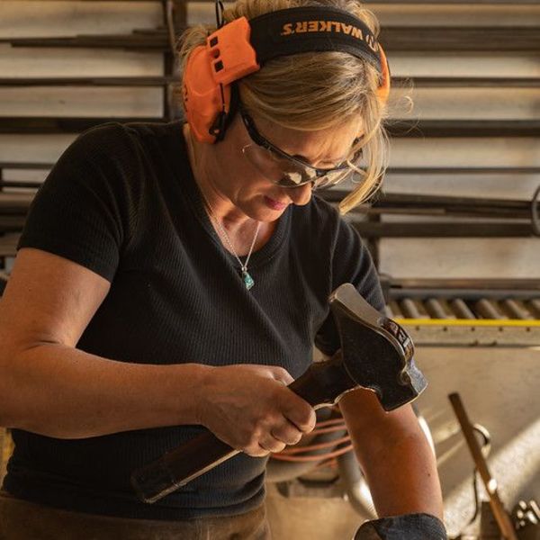 Artist Susan Madacsi forging texture into a leaf. by Susan Madacsi