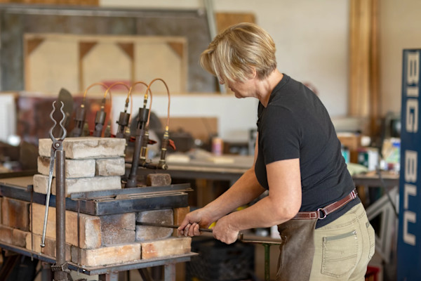 Artist Susan Madacsi at the forge. by Susan Madacsi, Image 11.
