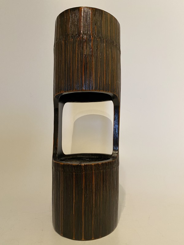 Tall lacquered ikebana vase