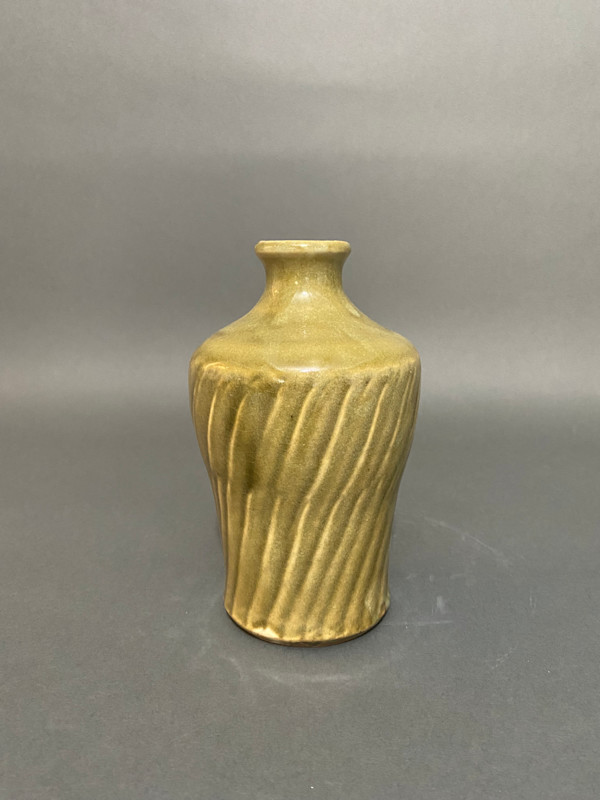Small bottle-shaped ceramic ikebana vase