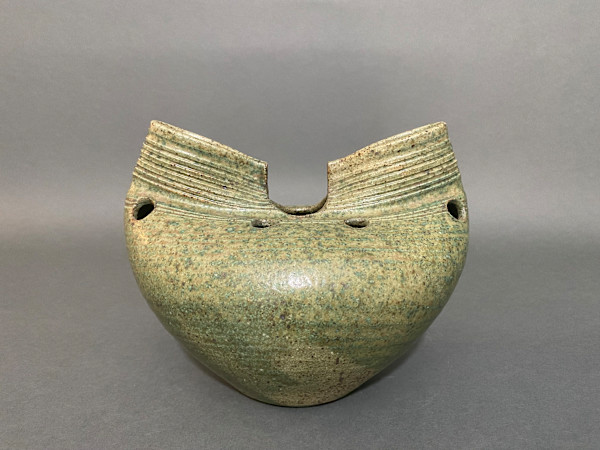Small green ceramic ikebana vase