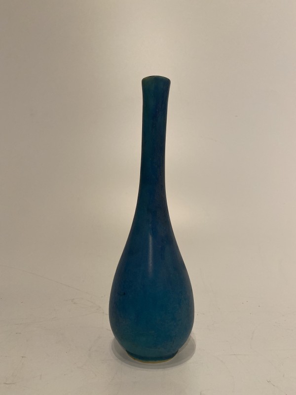 Small blue ceramic ikebana vase