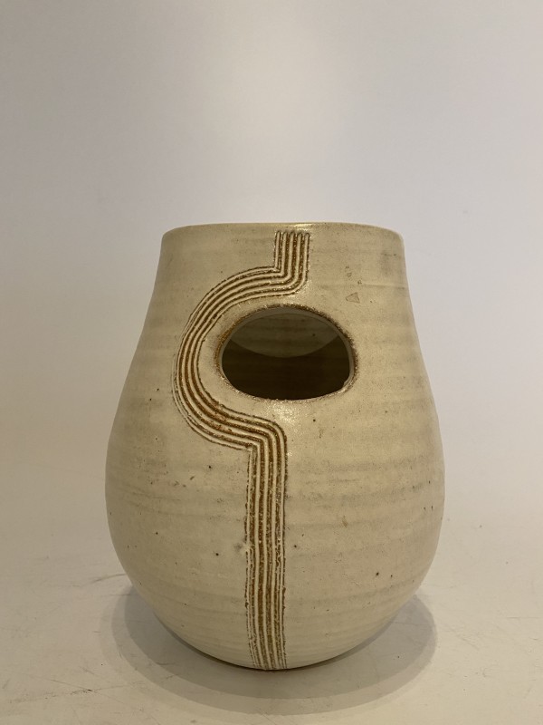White ceramic ikebana vase with round cutout