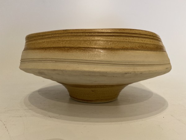 Round and flat ceramic ikebana vase