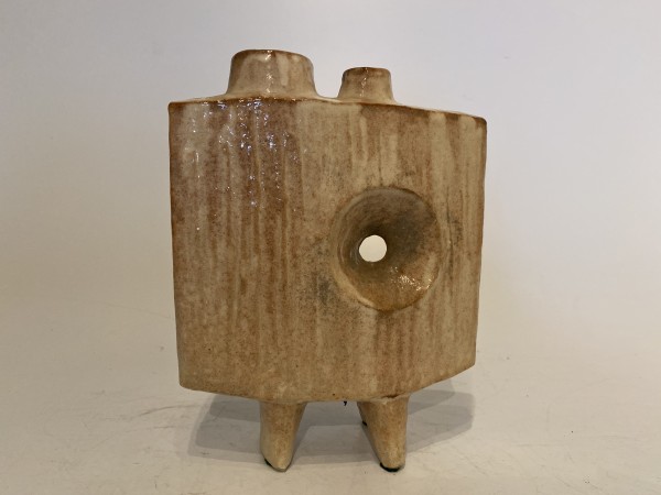 Tripod ikebana vase with round cutout