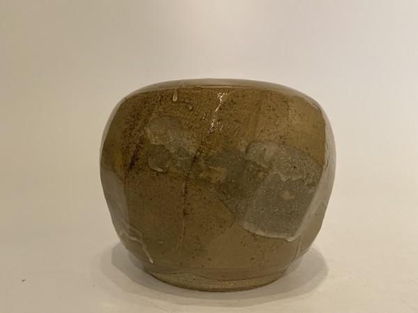 Round, brown ikebana vase