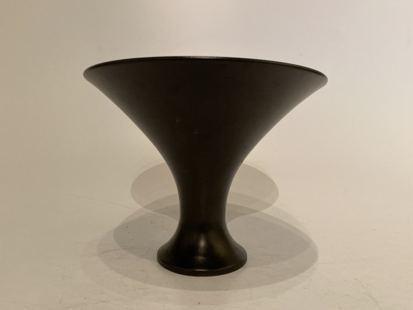 Black ikebana vase with wide rim