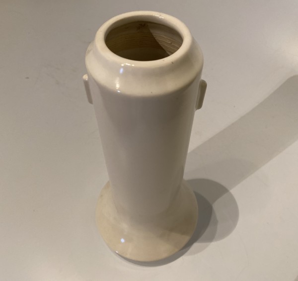 White ceramic ikebana vase