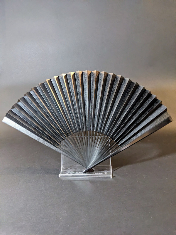 Black folding fan