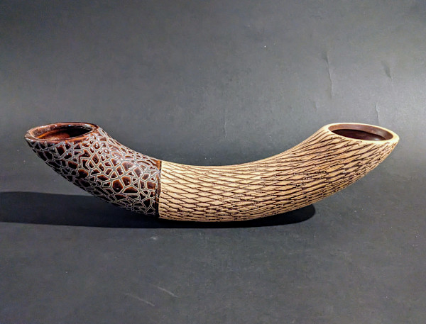 Curved ceramic ikebana vase