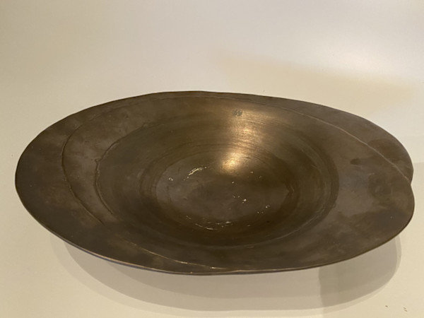 Shallow metal ikebana vase