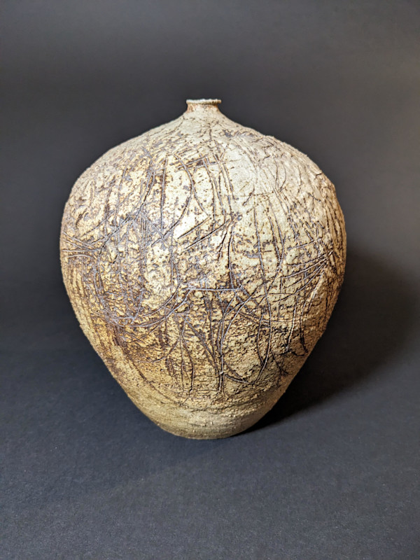 Globular ceramic ikebana vase