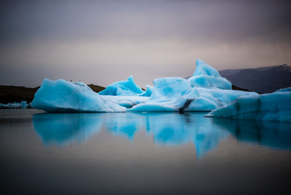 Iceberg Golden Hour Reflection - Jökulsárlón, Iceland