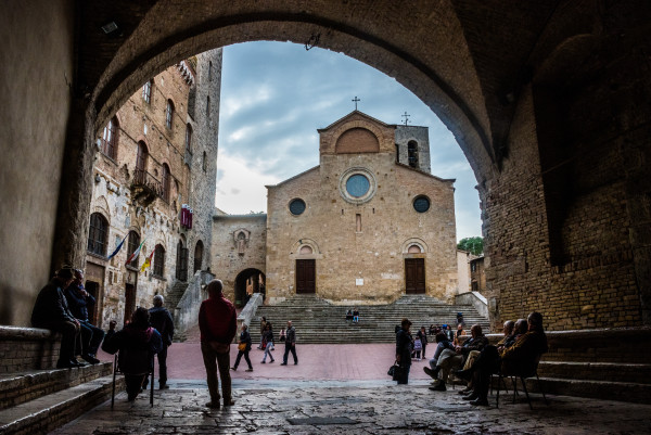 Village Elders in the Arch - San Gimignano, Italy by Jenny Nordstrom