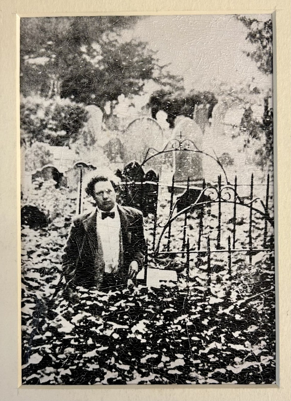 A shot of Dylan Thomas standing in the plot where he's buried by Sarah Walters