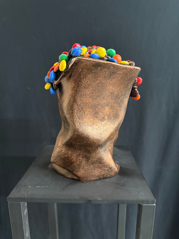Colored M&M Bag, Reproduction of a stone carving by Robin Antar, Image 1.