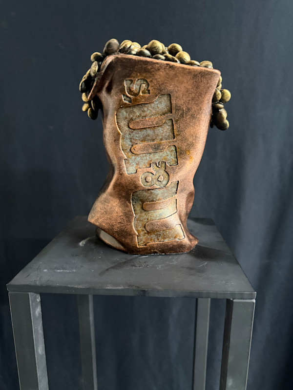 Gold M&M Bag, reproduction of a stone carving by Robin Antar, Image 1.