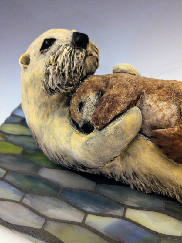 Otter Mom and Pup by Nancy Jakubowski