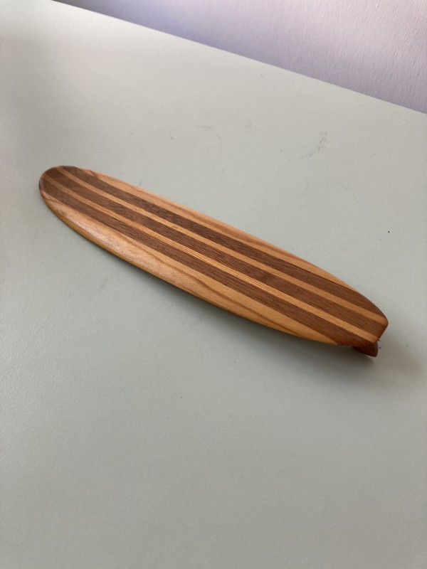 wooden surfboard by folk art unknown
