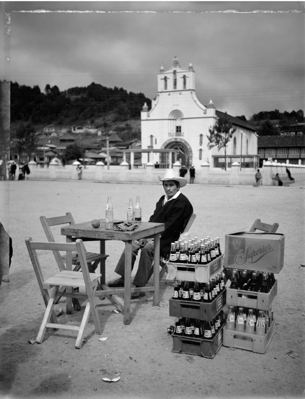 Marcos Xilón Gómez, A man is in the plaza having a drink by Wendy Ewald