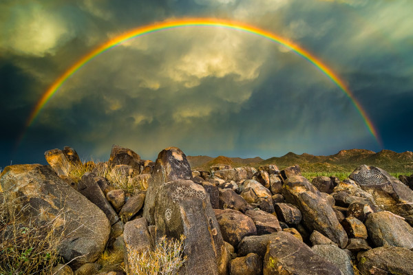 Rainbow Over Ancient Petroglyphs by Larry Simkins