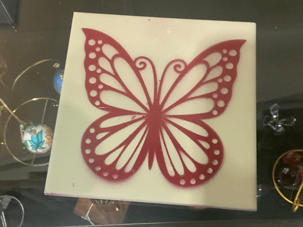 Small square trivet by Angelia Wilson, Image 1.